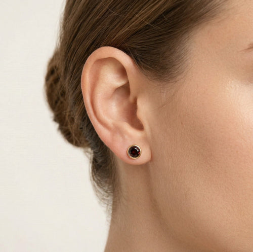 Round garnet stud earrings