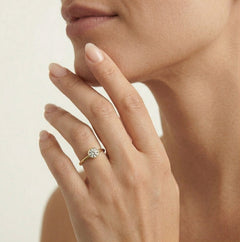 Yellow gold bezel set lustrous ring