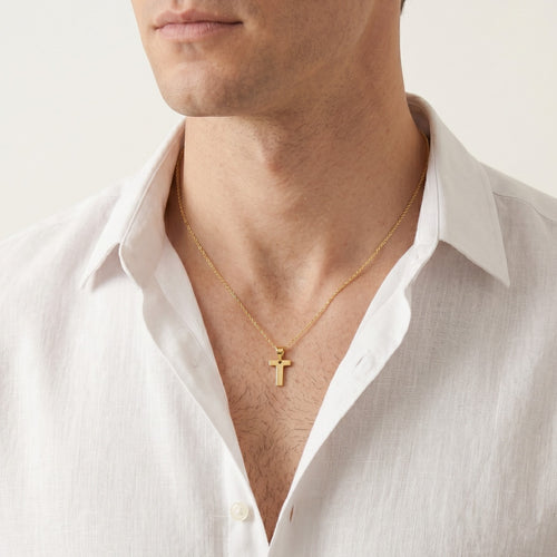 Pendente de oro con la letra T