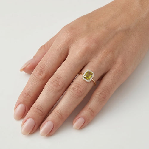 Radiant moldavite and cubic zirconia royal ring