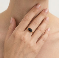 Solitaire garnet stone ring in yellow gold