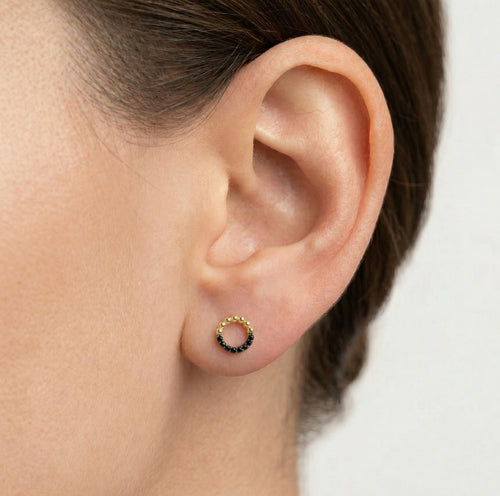 Yellow gold black onyx circle earrings