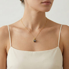 Pendentif Perle Noire Unique