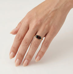 Solitaire garnet stone ring in yellow gold