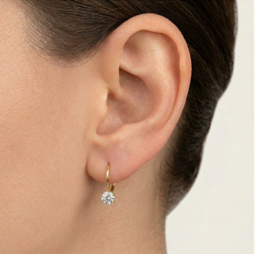 Six prong gold drop earrings