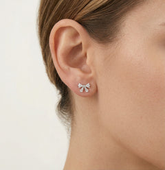 Silver bow stud earrings