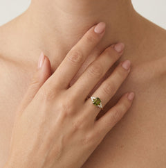 Stylish emerald cut moldavite ring with cubic zirconia