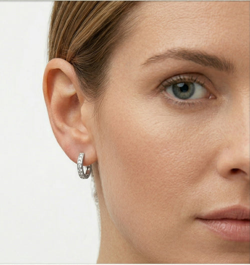 Channel-set white gold earrings
