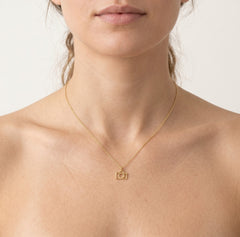 Pendentif appareil photo délicat en or