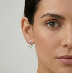 Silver stud earrings with half-ring cubic zirconia dangles