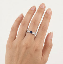 Blue sapphire and diamond baguette ring