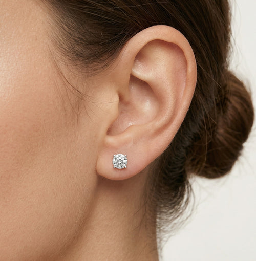 Classic four-prong solitaire earrings