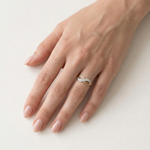 Prsten nekonečno ze žlutého a bílého zlata s kubickými zirkony