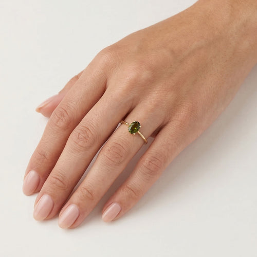 Elegant oval moldavite gold ring