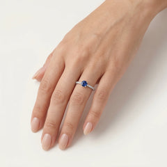 Fine white gold diamond ring with sapphire
