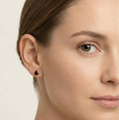 Round garnet stud earrings