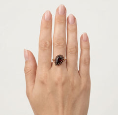 Pear and round garnet harmony ring