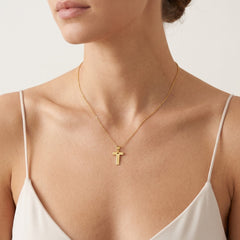 Pendente de oro con la letra T