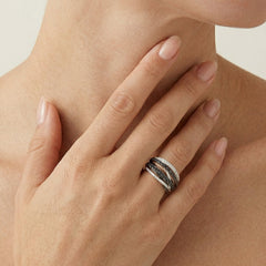 Elegant women ring with black and white diamonds