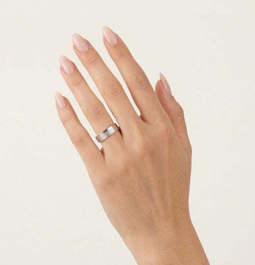 White and rose gold wave wedding ring