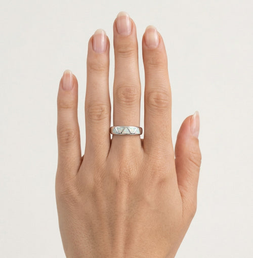 Sterling silver ring with white opal triangle design