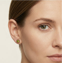 Eternal Radiance stud earrings in gold with moldavite and garnet