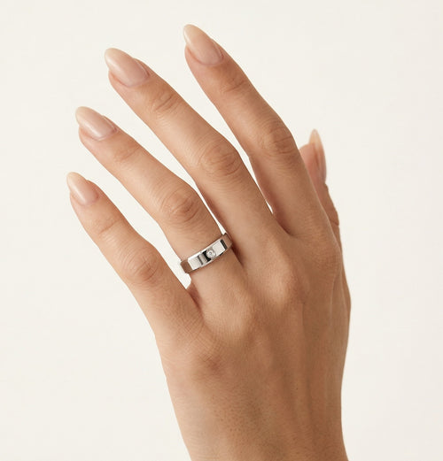 Alliance solitaire en or blanc