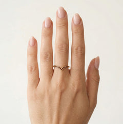 V shaped ring with garnet