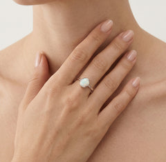 Sterling silver ring with white opal