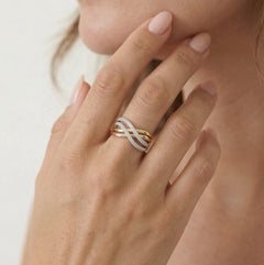 Twisted three tone gold diamond ring