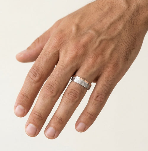 White and rose gold wave wedding ring