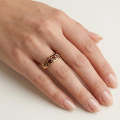 Yellow gold ring with pear and round garnets