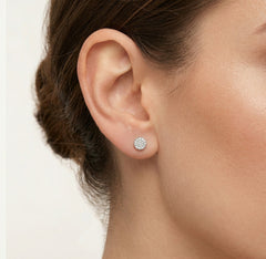 Dazzling round cut diamond earrings in lustrous white gold