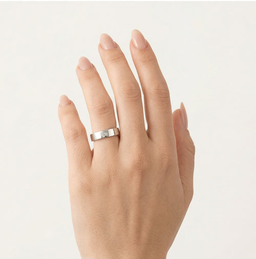 Široký solitérní platinový snubní prsten