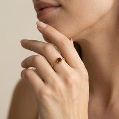 Solitaire garnet cushion cut ring