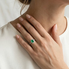 Beautiful white gold diamond ring with emerald