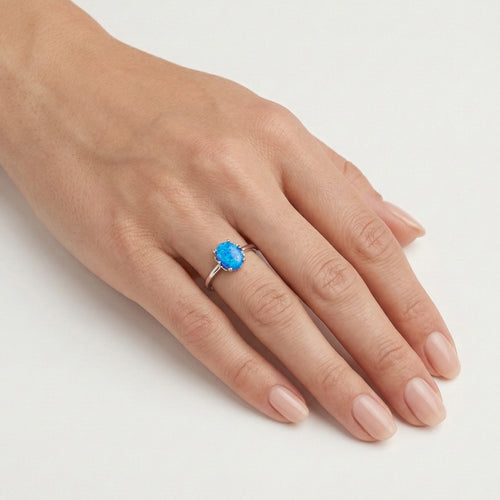 Bague couronne avec opale bleue
