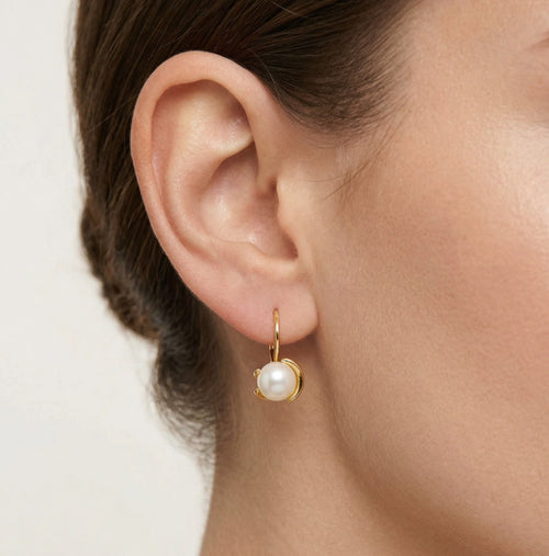 **Boucles d'oreilles uniques en perle blanche**