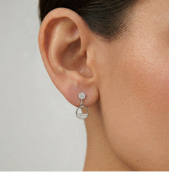 Silver stud earrings with half-ring cubic zirconia dangles
