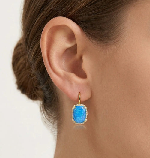 Masivní zlaté náušnice s kabošonským modrým opálem