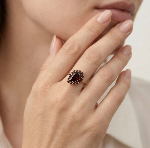 Pear and round garnet harmony ring