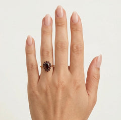 Dazzling duo pear and round garnet ring