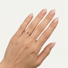 Bague de mariage en or rose avec symboles