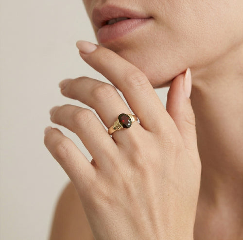 Solitaire garnet oval cut ring