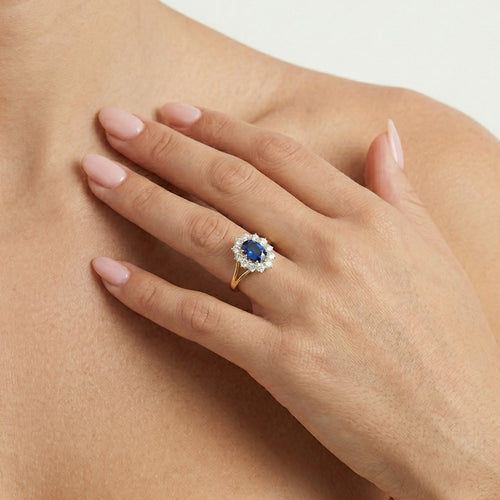 Bague en or jaune avec zircone cubique et saphir