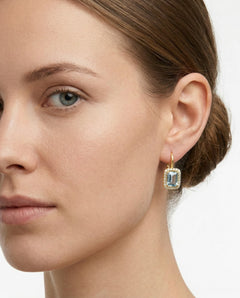 Zlaté náušnice s modrým topazem