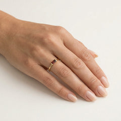 Yellow gold simple ring with radiant cut garnet