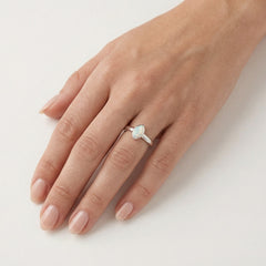 Sterling silver ring with oval white opal