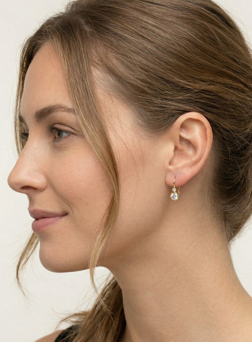 Ohrringe aus Gold mit Zirkonia in Zargenfassung