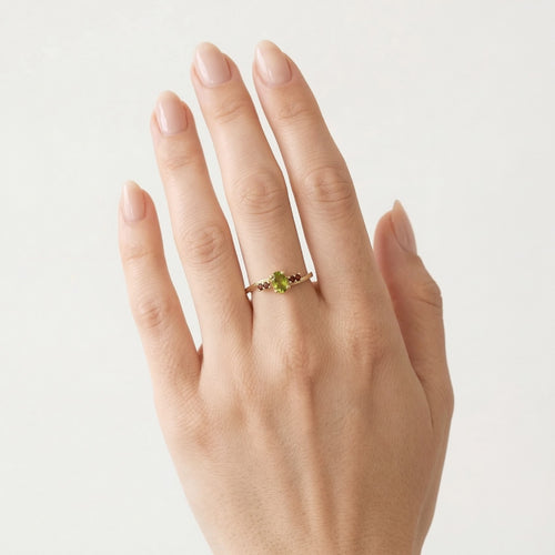 Enchanting moldavite and garnet gold ring